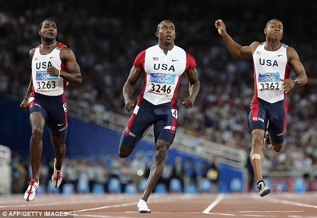 Shawn Crawford gives his silver medal to Kim Collins
